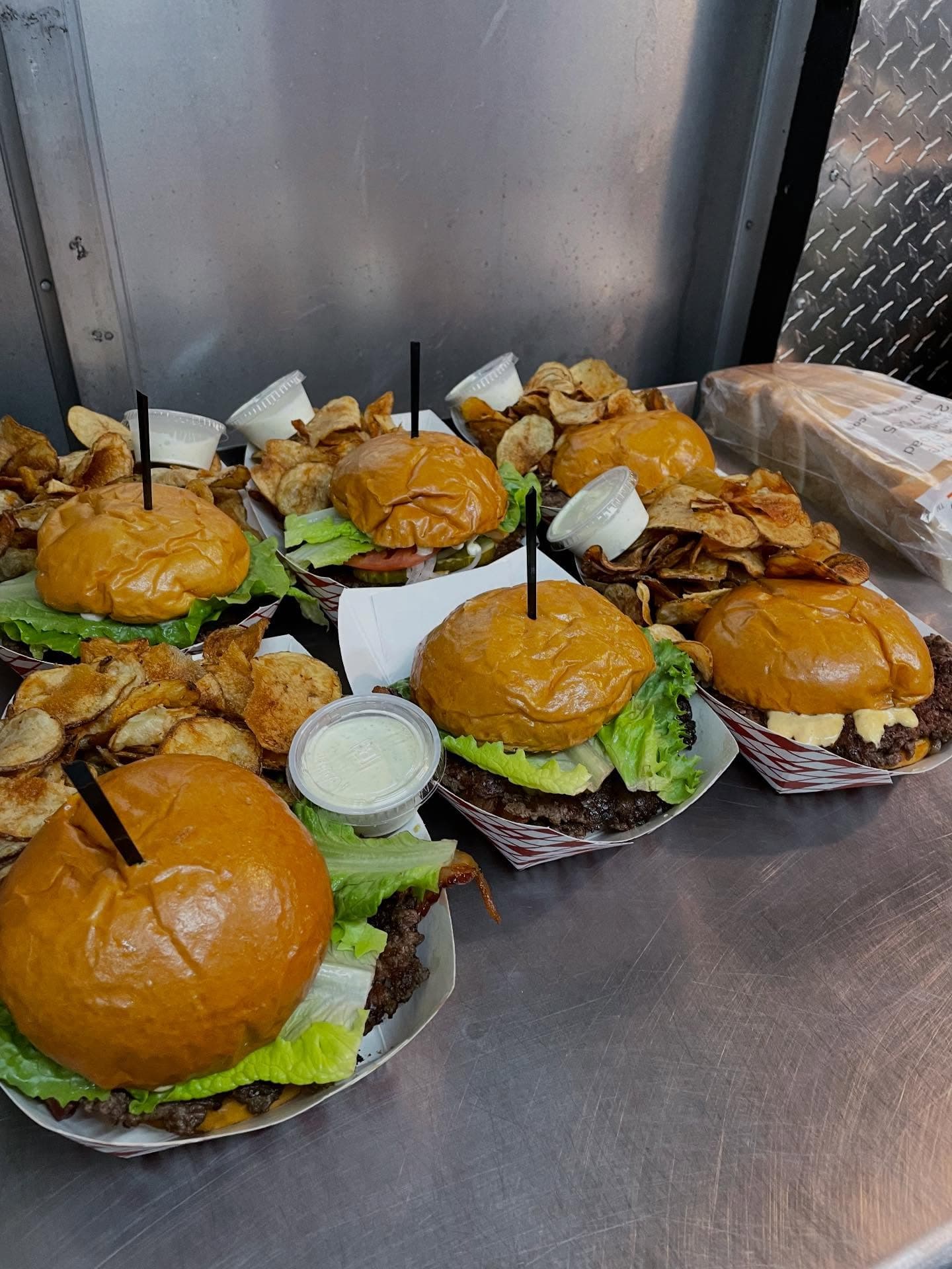 Loaded burgers fresh off the grill